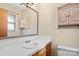 Clean bathroom featuring a vanity, sink, and medicine cabinet at 214 Costner Dr, Bessemer City, NC 28016