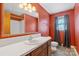 Simple bathroom with single sink vanity, toilet and shower at 214 Costner Dr, Bessemer City, NC 28016