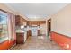 Functional kitchen featuring wood cabinets and a view to backyard at 214 Costner Dr, Bessemer City, NC 28016