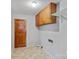 Laundry room with washer/dryer hookups and shelving at 214 Costner Dr, Bessemer City, NC 28016