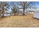 Large backyard with detached shed and mature trees at 2829 1St Nw Ave, Hickory, NC 28601