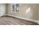 Spacious bedroom with wood-look floors and a view at 2829 1St Nw Ave, Hickory, NC 28601