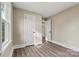 Bedroom with wood-look floors and access to other rooms at 2829 1St Nw Ave, Hickory, NC 28601