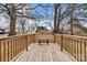 Wooden deck with bench overlooking backyard at 2829 1St Nw Ave, Hickory, NC 28601