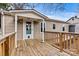 Back exterior with wooden deck and access to backyard at 2829 1St Nw Ave, Hickory, NC 28601