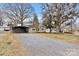 House exterior with carport and gravel driveway at 2829 1St Nw Ave, Hickory, NC 28601