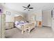 The main bedroom boasts a decorative bed frame, carpet flooring, and natural lighting at 2865 Scarborough Ct, Gastonia, NC 28054