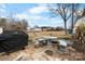 Spacious backyard features a grilling area with a stone table and a covered grill for outdoor enjoyment at 2907 1St Nw Ave, Hickory, NC 28601