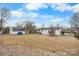 Wide-open backyard with a storage shed and ample space for outdoor activities at 2907 1St Nw Ave, Hickory, NC 28601