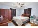 Bedroom with wood floors, a ceiling fan, and ample closet space at 2907 1St Nw Ave, Hickory, NC 28601