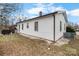 Exterior view of the house features white siding and updated HVAC system at 2907 1St Nw Ave, Hickory, NC 28601