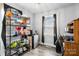 Well-lit storage area with metal shelving, a small window, and laminate flooring at 2907 1St Nw Ave, Hickory, NC 28601