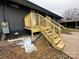 Newly built wooden back stairs leading to a deck at 3027 Remington St, Charlotte, NC 28216