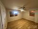 Bright bedroom with two windows and hardwood floor at 3027 Remington St, Charlotte, NC 28216