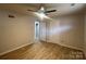 Spacious bedroom with new flooring and ceiling fan at 3027 Remington St, Charlotte, NC 28216