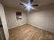 Bright bedroom with ceiling fan and laminate flooring at 3027 Remington St, Charlotte, NC 28216