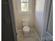 Small bathroom with toilet and window at 330 West Blvd, Charlotte, NC 28203