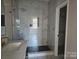 Modern bathroom with marble tile and walk-in shower at 330 West Blvd, Charlotte, NC 28203