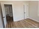 Spacious bedroom with hardwood floors and ample closet space at 330 West Blvd, Charlotte, NC 28203