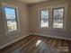 Bright bedroom with hardwood floors and large windows at 330 West Blvd, Charlotte, NC 28203