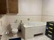 Bathroom with built-in bathtub and tile flooring at 3333 Audrey Dr, Gastonia, NC 28054