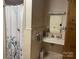 Clean bathroom with shower stall, vanity, and medicine cabinet at 3333 Audrey Dr, Gastonia, NC 28054