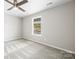 Bedroom with carpet, ceiling fan, and a window with a view at 344 Luther Scronce Rd, Vale, NC 28168