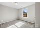 Bedroom with neutral walls, carpet, and a window at 344 Luther Scronce Rd, Vale, NC 28168