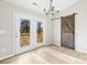 Dining area with barn door and access to deck at 344 Luther Scronce Rd, Vale, NC 28168