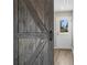 Modern farmhouse entry with barn door and view into the home at 344 Luther Scronce Rd, Vale, NC 28168