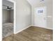 Bright entryway with wood-look flooring and view of bedroom at 344 Luther Scronce Rd, Vale, NC 28168