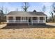 Newly constructed craftsman style home with front porch and landscaped yard at 344 Luther Scronce Rd, Vale, NC 28168