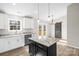 Modern kitchen with granite countertops and island at 344 Luther Scronce Rd, Vale, NC 28168