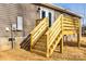 Wooden stairs leading from the deck to the yard at 344 Luther Scronce Rd, Vale, NC 28168