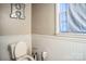 Simple bathroom with toilet and window at 400 Charles St, Spencer, NC 28159