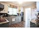 Galley style kitchen with gray cabinets and granite countertops at 400 Charles St, Spencer, NC 28159