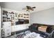 Living room with built-in shelving and fireplace at 400 Charles St, Spencer, NC 28159