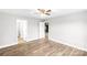 Bedroom with wood-look floors and access to bathroom and kitchen at 413 Peach St, Kannapolis, NC 28083