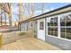 Home features a wooden deck and grey siding at 413 Peach St, Kannapolis, NC 28083