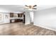 Modern kitchen featuring dark wood cabinets and stainless steel appliances at 413 Peach St, Kannapolis, NC 28083