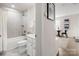 Stylish bathroom with a shower/tub combo and white vanity at 414 W Tremont Ave, Charlotte, NC 28203