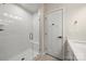 Bathroom with a walk-in shower and a linen closet at 414 W Tremont Ave, Charlotte, NC 28203