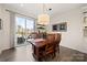 Charming dining area with hardwood floors and wood dining table at 414 W Tremont Ave, Charlotte, NC 28203