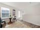 Small dining area with glass table and two chairs at 414 W Tremont Ave, Charlotte, NC 28203