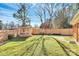 Landscaped backyard with a storage shed at 4944 Cornelia Dr, Charlotte, NC 28269