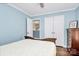 Bedroom with a queen-size bed and access to loft at 4944 Cornelia Dr, Charlotte, NC 28269