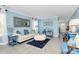 Light blue living room with tiled floors, comfy sofas, and tasteful decor at 4944 Cornelia Dr, Charlotte, NC 28269