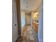 Spacious bathroom featuring double sinks, a soaking tub, and tile flooring throughout at 5421 Roberta Meadows Ct, Concord, NC 28027