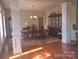 Elegant dining room featuring hardwood floors and stylish furnishings at 5421 Roberta Meadows Ct, Concord, NC 28027