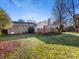 Spacious backyard with deck and grassy area at 6412 Wheeler Dr, Charlotte, NC 28211